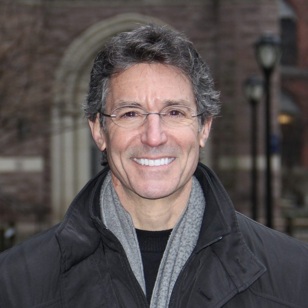 David L Katz MD in winter coat and scarf in front of Yale University building January 2020