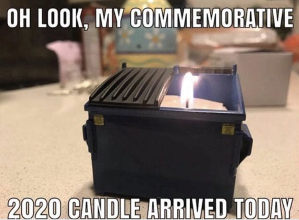 Candle inside mini-coffin with caption: "Oh look, my commemorative 2020 candle arrived today"