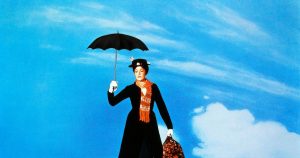 Mary Poppins with umbrella in right hand and suitcase in left hand flies gracefully in the sky.