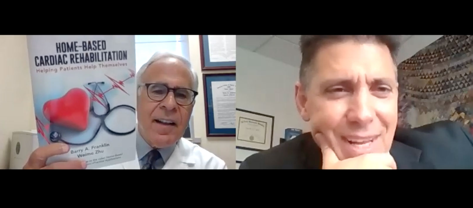 Barry Franklin PhD on left holds up his booklet, Home-Based Cardiac Rehabilitation, during Zoom interview with Tom Rifai, MD at right