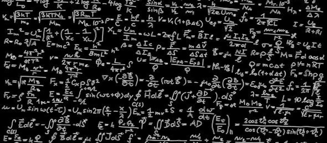 Blackboard covered with mathematical formulas.